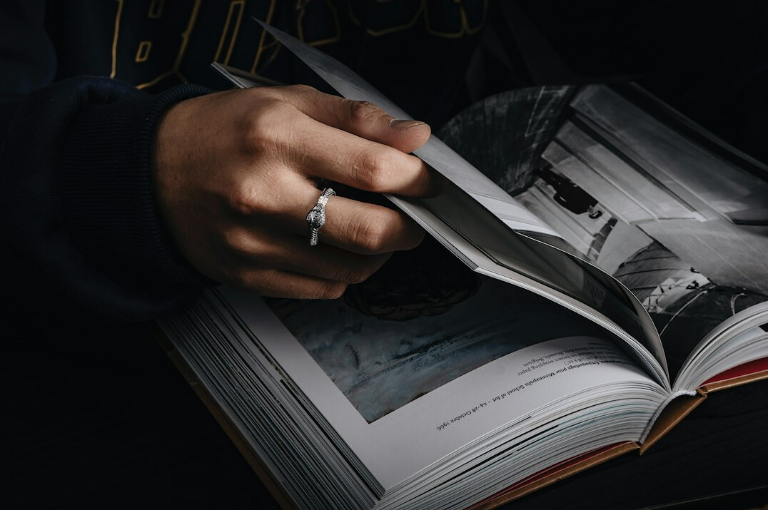 detective reading mystery book