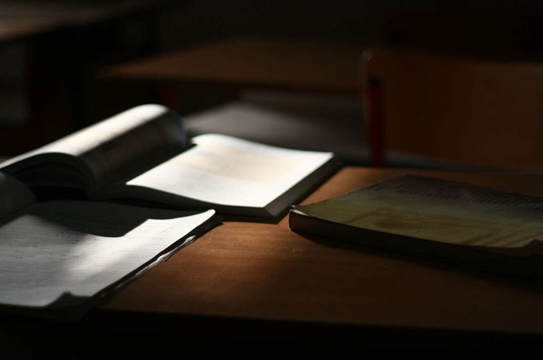 open mystery book on desk